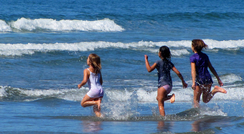 kids at La Push beach on the Olympic Peninsula, WA