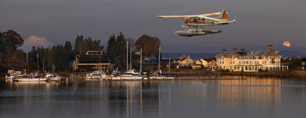 A plane flying over Port Ludlow Resort on the Olympic Peninsula