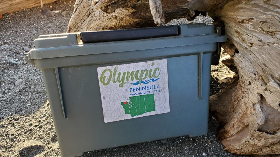 A geocache box on the beach