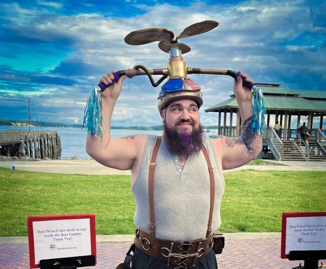 Photo of someone dressed up in a steampunk outfit at the Brass Screw Consortium Steampunk Festival in Port Townsend, WA