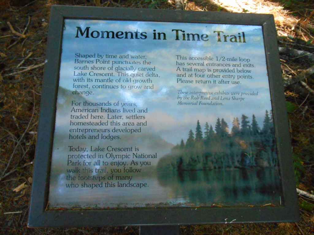An interpretive sign on the Moments of Time Trail.