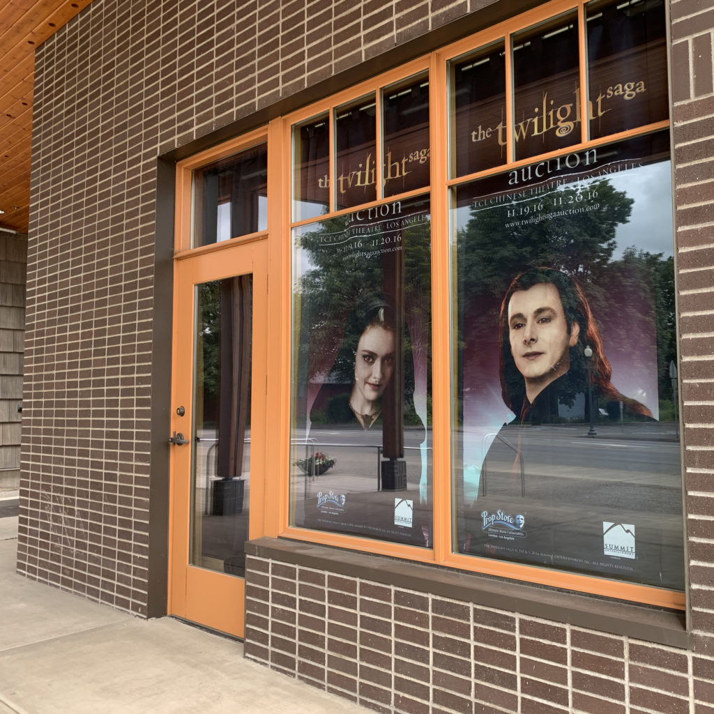 The outside windows of the Forever Twilight in Forks Collection with pictures of vampire cosplayers