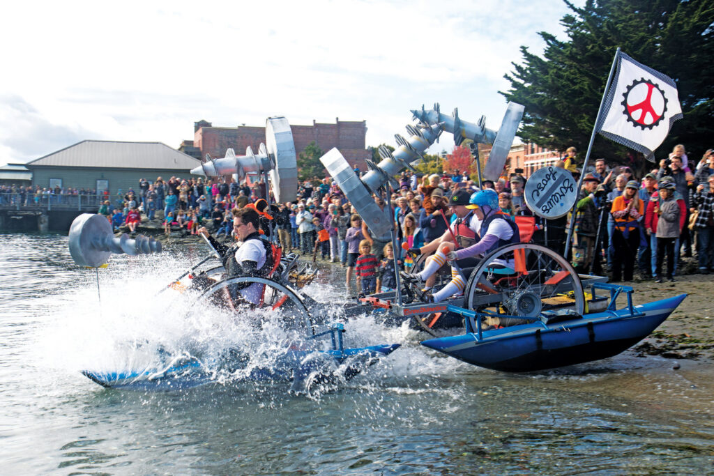 Photo of a kinetic sculpture entering the water during race in Port Townsend, WA on the Olympic Peninsula