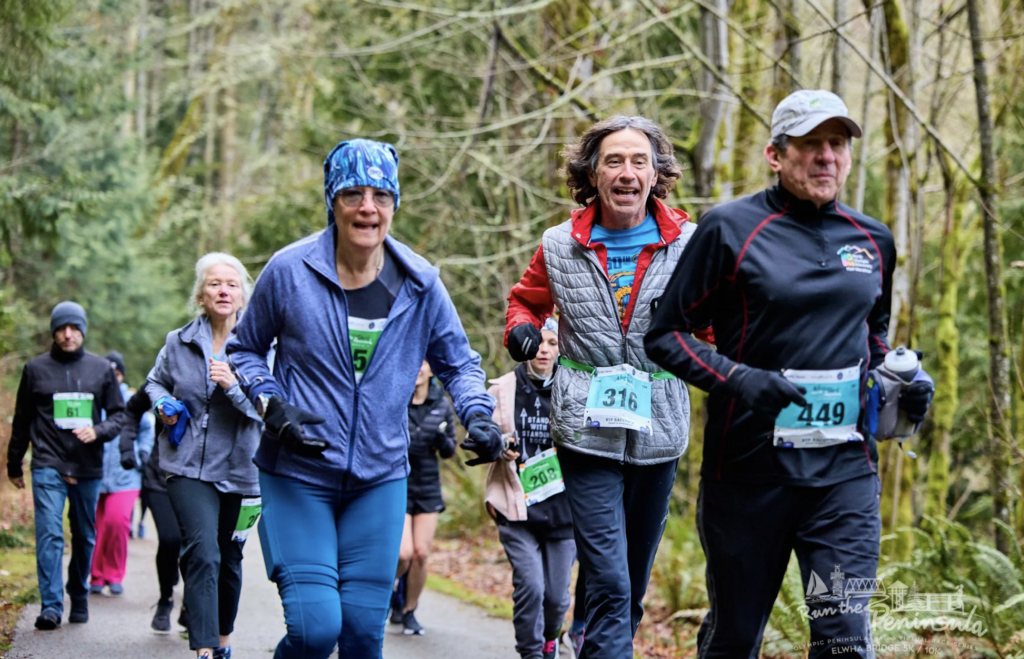 Photo of participants running during the Spruce Railroad Race during the Run the Peninsula Series on the Olympic Peninsula