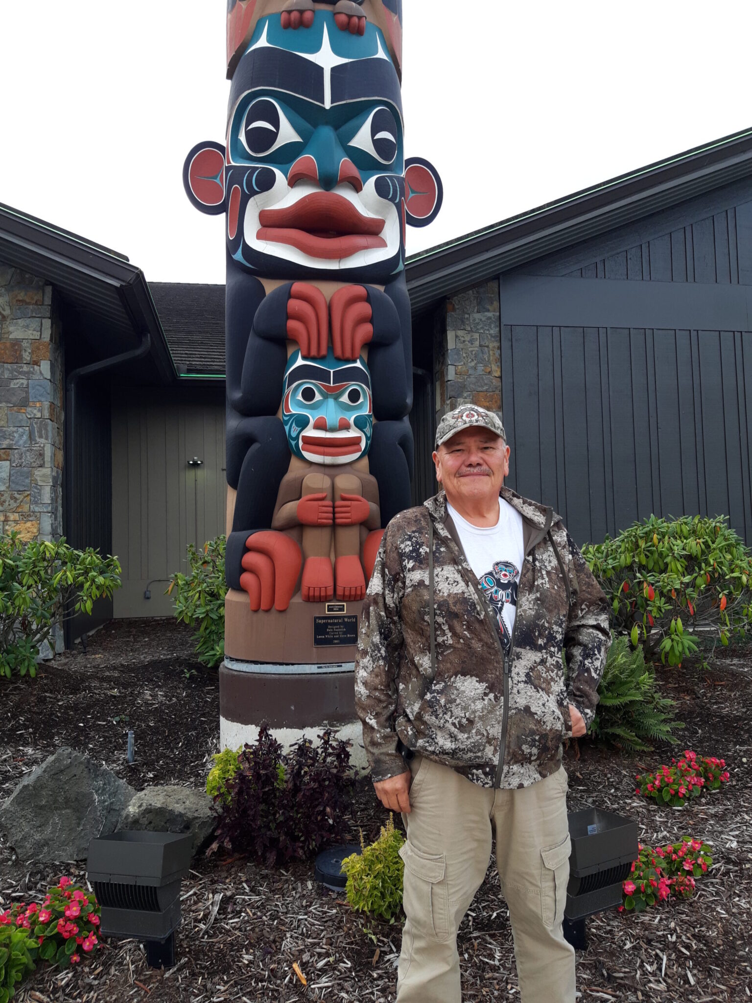 Tom Sewid next to Sasquatch totem pole - Looking for Sasquatch on the Olympic Peninsula