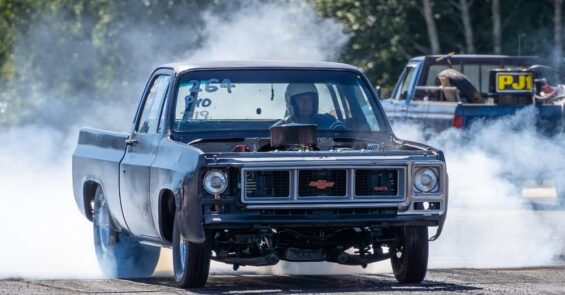 Photo of a Chevy truck doing a burnout at a West End Thunder drag racing event on the Olympic Peninsula in Washington state