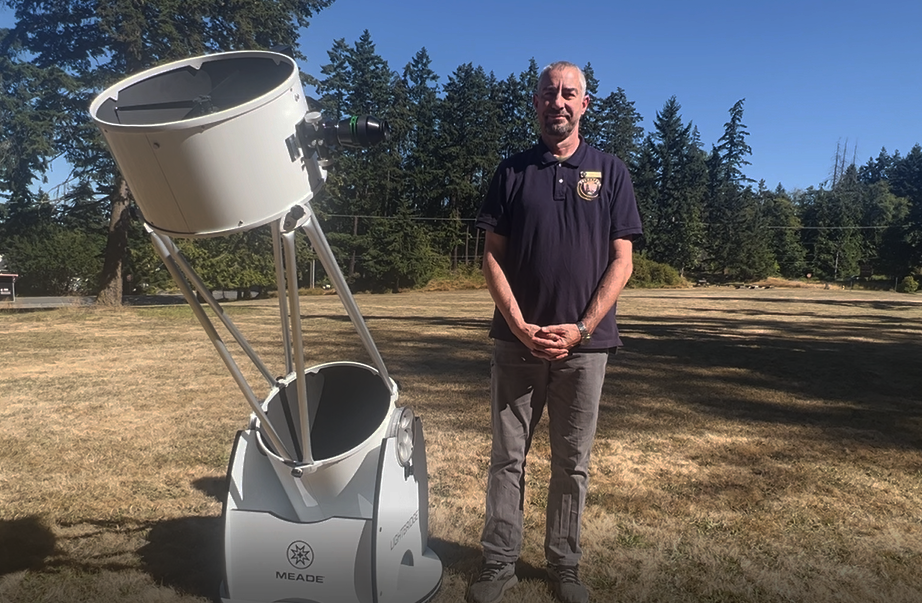 Photo of John Goar with Telescope -Hurricane Ridge Astronomy Program Reveals Treasures in Olympic National Park on the Olympic Peninsula.