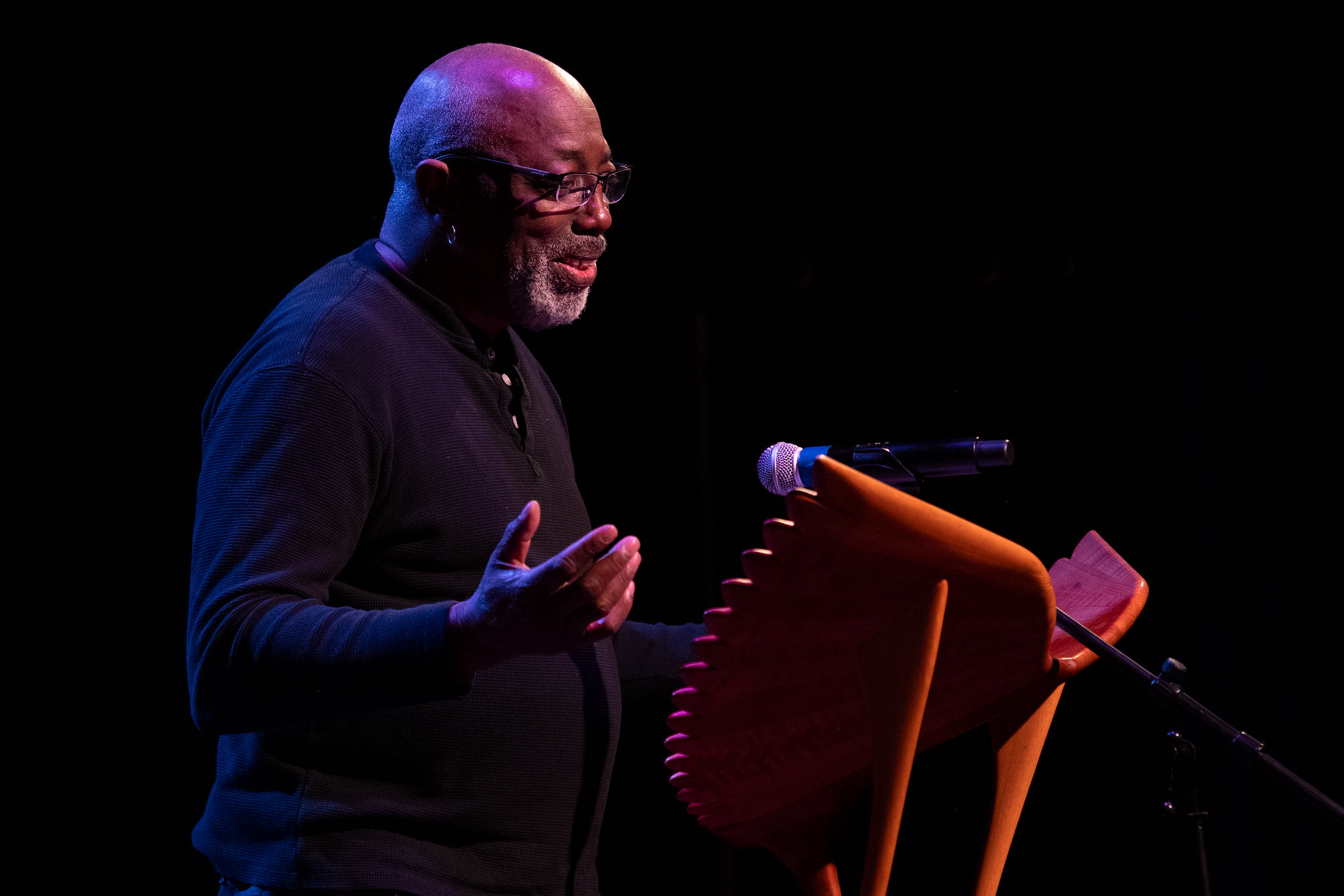 Photo of Port Townsend poet, Gary Copeland Lily, welcoming reader and writers to a conference at Centrum.