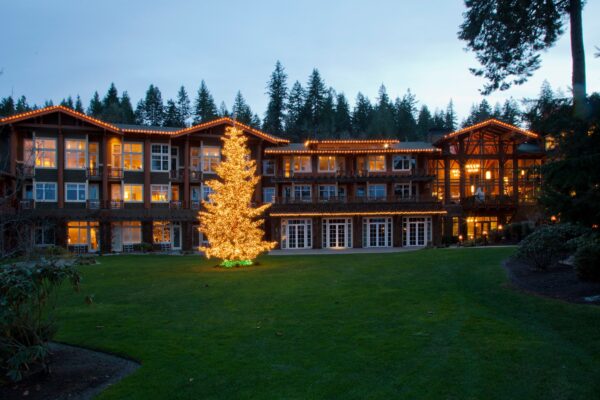 PHOTO of Alderbrook Resort with lit up Christmas tree in front lawn