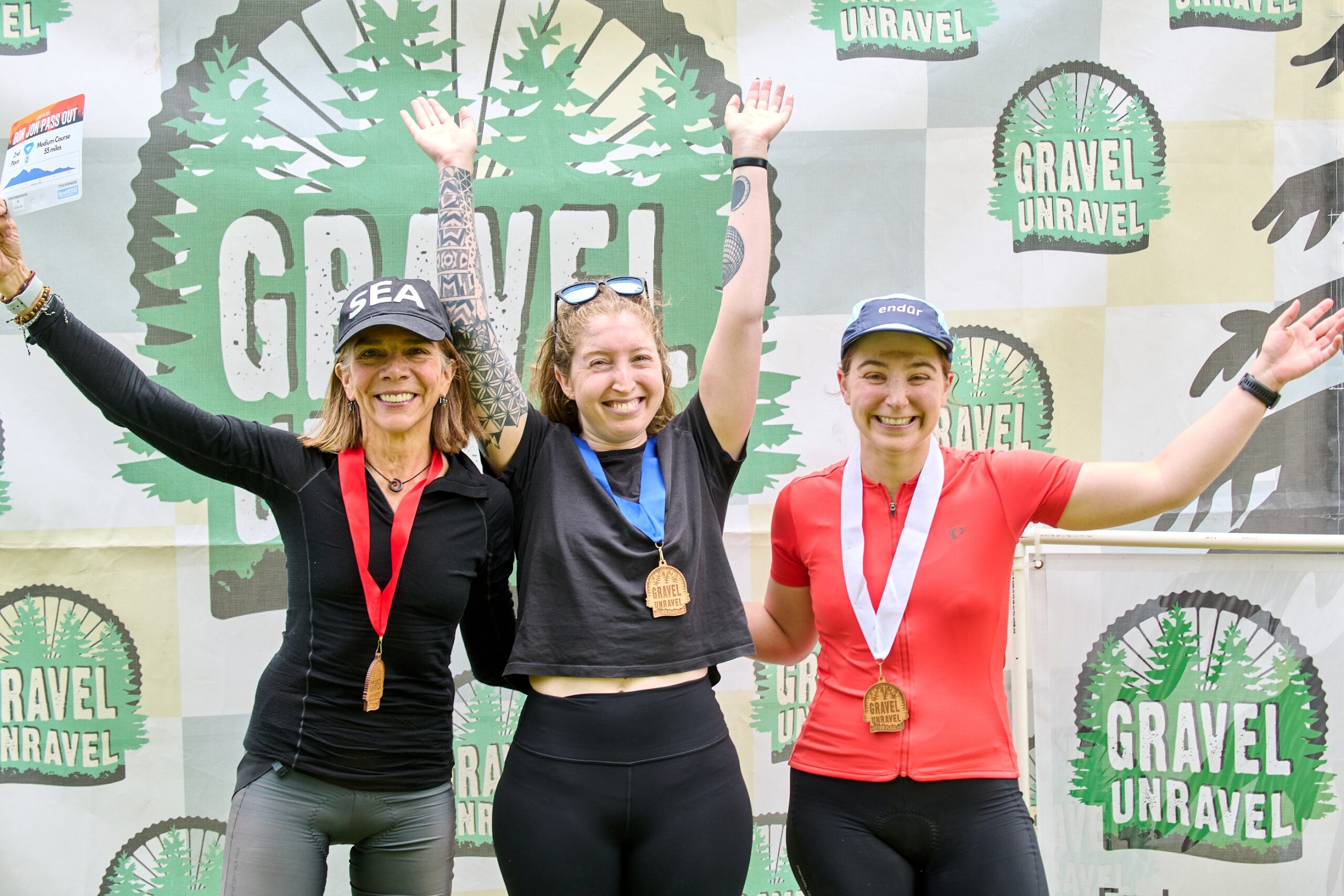 Gravel Unravel race participants celebrating their acheivements