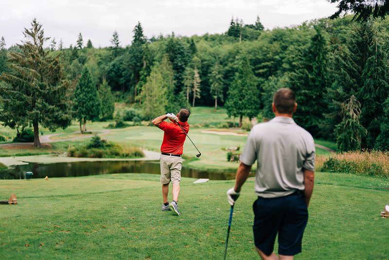 Photo of golfers playing the resort at Port Ludlow | Golf on the Olympic Peninsula: A Good Walk With a Great View